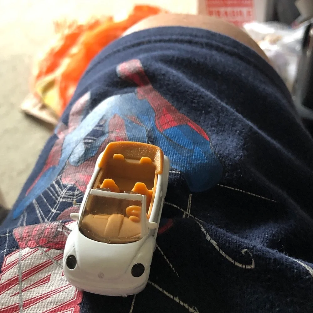 White Convertible Toy Car with Tan Interior